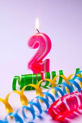 lit number candles with a ribbon