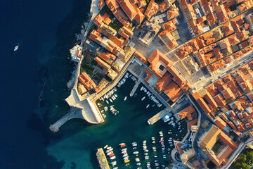 Dubrovnik, Croatia. Aerial view on the old town. Vacation and adventure. Town and sea. Top view from drone on the old castle and blue sea.