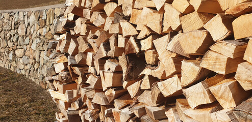 Chopped wood and stones. Panorama.