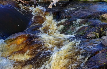 water flowing over rocks
