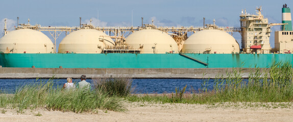 LNG TANKER - Ship at a gas terminal in a seaport
