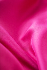 Fototapeta na wymiar Silk Fabric Wave Texture Background, Red Satin Cloth Texture. Fabric silk texture