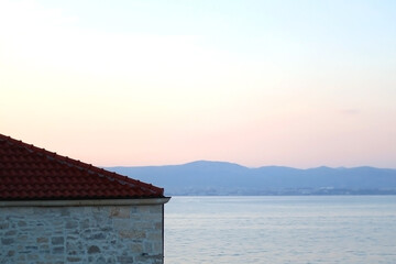 Traditional Mediterranean house on island Brac, Croatia, at sunset. Selective focus.