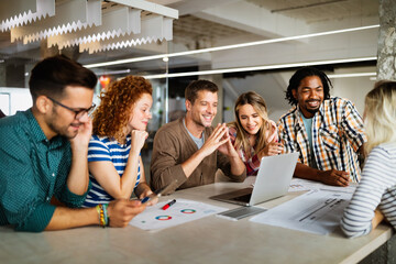 Group of successful business people designers architects in office