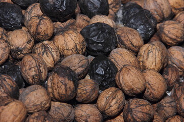 texture of freshly picked walnuts in a thick skin from a walnut tree