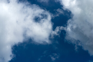 Cumulus clouds in the blue sky during the day in Sunny weather