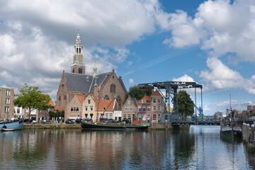 Fototapeta na wymiar view on the Marnixkade and the Groote Kerk, Maassluis, Holland