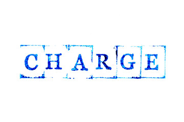 Blue color ink of rubber stamp in word charge on white paper background