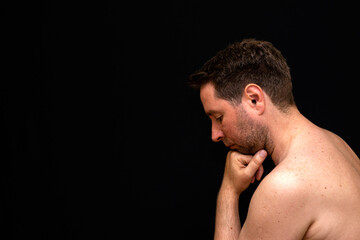 Side view sad thoughtful undressed handsome male demonstrating reverie.