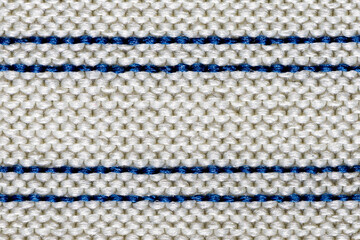White knitted cotton fabric with stripes texture background.