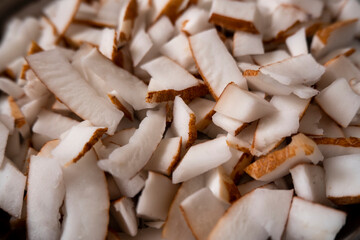 top view of fresh coconut fibrous meats slices group