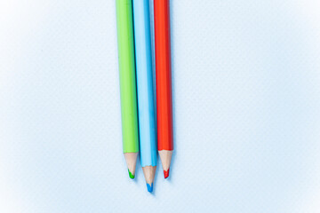 colored pencils on white background