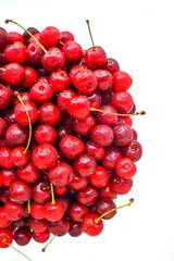 Red cherry ripe juicy on a white background.