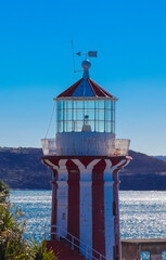 Fototapeta na wymiar White and Red lighthouse in Sydney NSW Australia