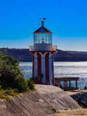 Fototapeta na wymiar White and Red lighthouse in Sydney NSW Australia