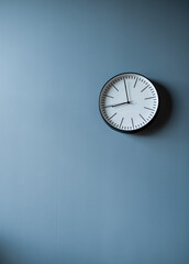 Photo of a clock on the wall in the room