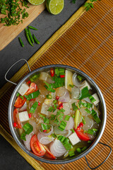 Braised beef clear with meat tendon soup stew, Thai food.