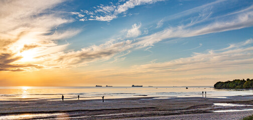 Naklejka premium Summer Sunset on the beach