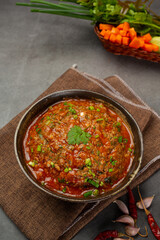 Ong chili paste in a mortar Decorated with beautiful side dishes.