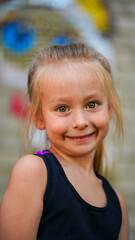Portrait of young gymnast girl in sport black top