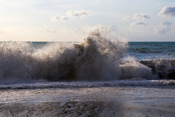 Stormy Black sea. Water background, stormy weather, waves and splashes in Batumi, Georgia.
