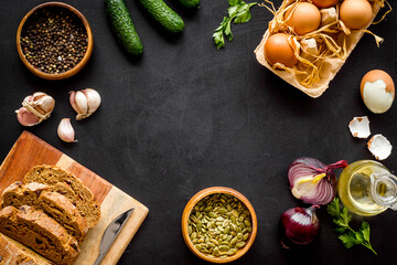 Top view frame of dinner table with fresh homemade food - effs, bread, potatoes