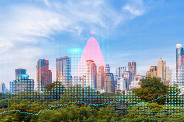 Obraz premium Forex and stock market chart hologram over panorama city view of Bangkok, the financial center in Asia. The concept of international trading. Double exposure.