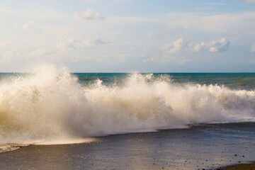 Stormy Black sea. Water background, stormy weather, waves and splashes in Batumi, Georgia.