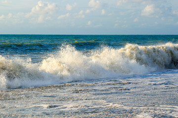 Stormy Black sea. Water background, stormy weather, waves and splashes in Batumi, Georgia.