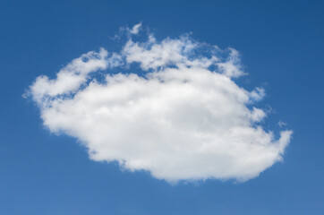 Single white clouds on blue sky