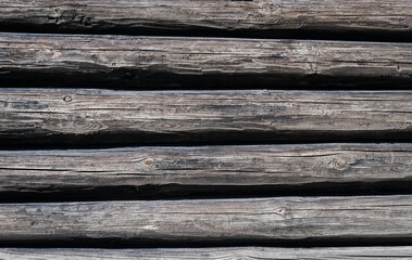 Obraz premium Old wooden wall of a rustic house with texture. Wood pattern background.