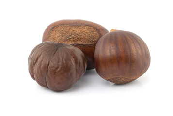 Close up of roasted horse chestnuts isolated on white background with clipping path.