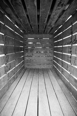 wooden animal transport box inside black and white background