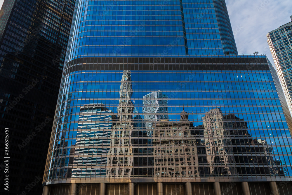 Wall mural reflection of the chicago skyline in the windows of high rise hotel, chicago, illinois, usa