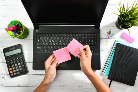 girl blogger holding a sticker in her hands, flatlay photo