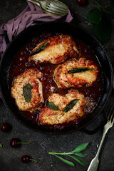 Pork chops with cherry sauce.top view