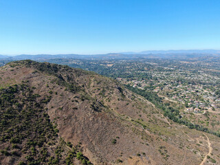 Fototapeta na wymiar Aerial view of Rancho Bernardo town and mountain with great hiking trail, East San Diego County, California, USA 