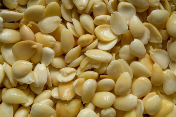 almonds as background, top view. Healthy snack. Wet almonds. Peeled almond