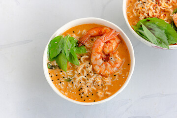Shrimp Noodle Bowls Garnished with Fresh Basil Top Down Food Photo