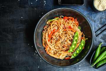 rice noodles with vegetables cellophane pasta food background top view copy space for text organic eating healthy