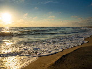 The sea at sunset in Tuscany Italy