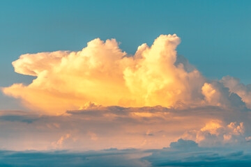 Naklejka na ściany i meble Sunset in the sky clouds