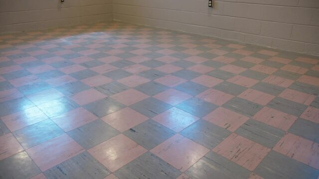 House Basement with Asbestos Vinyl Flooring. Cancer causing material, wide shot