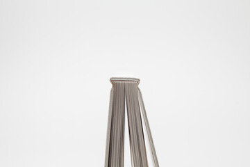 White book with no title standing on white background