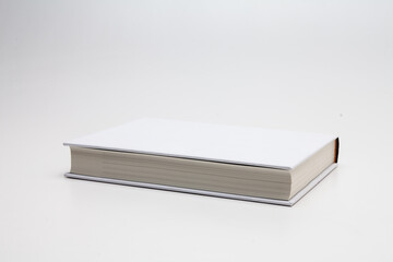 Blank book cover white on white background