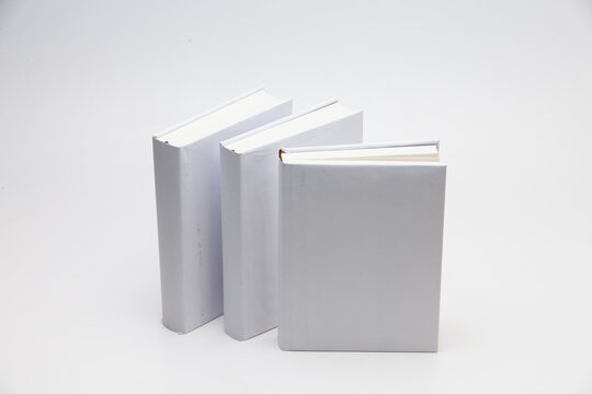 Stand blank white books on white background