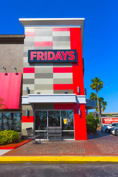 Orlando, USA - May 8, 2018: TGI Fridays exterior and logo. TGI Friday's is an American restaurant chain focusing on casual dining.
