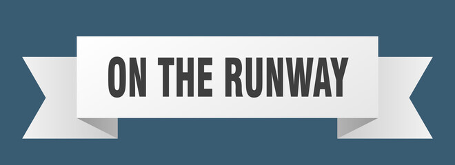 on the runway ribbon. on the runway paper band banner sign