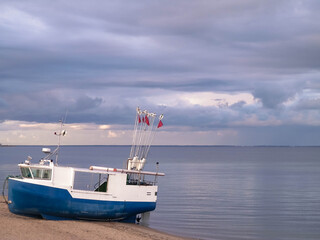 Fishing boat on a Baltic Sea coast in Mechelinki, Poland.