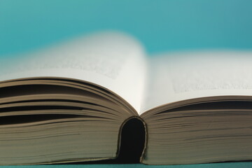 open book on a blue background